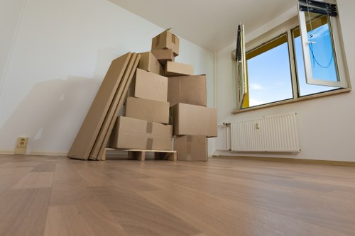 Removal team planning a move in a Highbury residential street