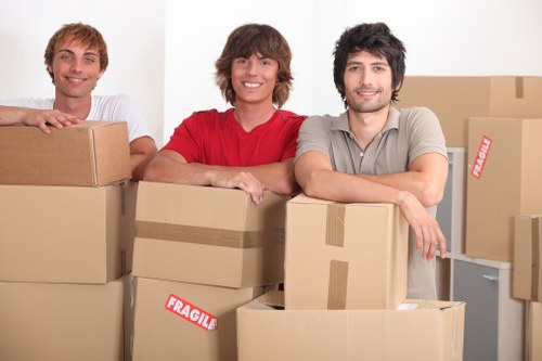 Movers handling furniture during a relocation