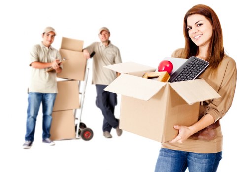 Packed moving boxes and furniture ready for a Highbury house move