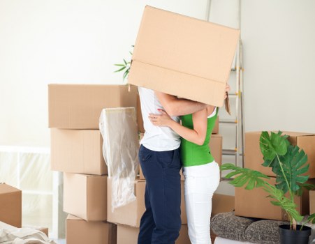 Local moving helpers carrying boxes and household items in Highbury