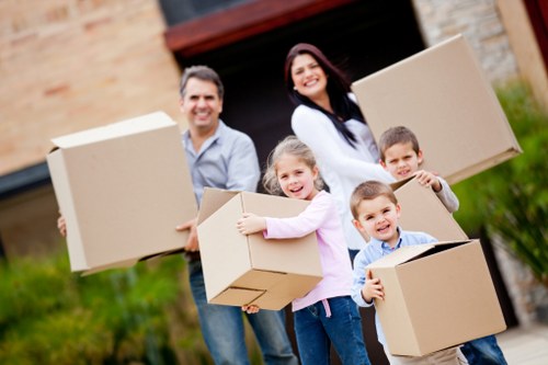 Packed boxes and furniture ready for a Highbury flat relocation
