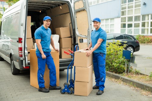 Packed boxes and careful loading for a house relocation in Highbury